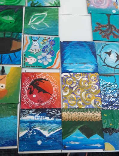 Close up shot of the individual tiles of paintings students painted.